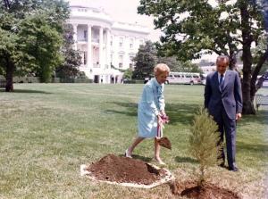 On the first Earth Day, April 22, 1970, President Nixon and First Lady Pat Nixon plant a California Giant Sequoia tree