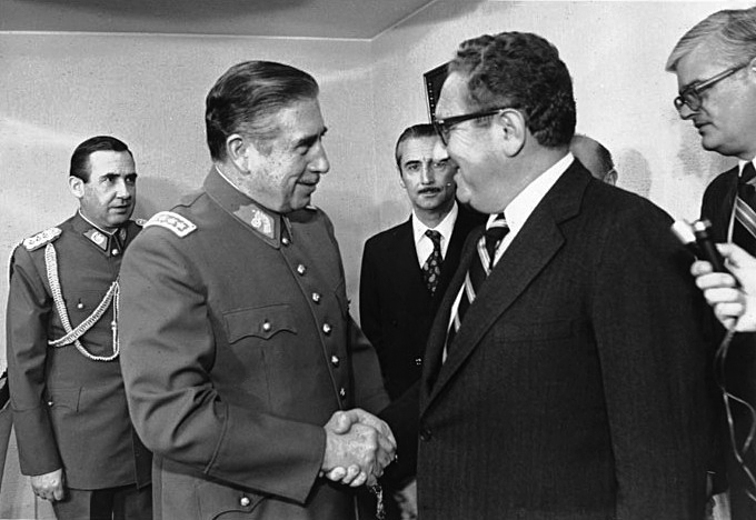 Chile’s ruler Augusto Pinochet meeting U.S. Secretary of State Henry Kissinger in Santiago, 8 June 1976 (Wikimedia Commons)
