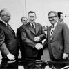 Anatoly Dobrynin looks on as Andrei Gromyko and Henry Kissinger shake hands prior to their talks in Geneva, July 10, 1975 (courtesy AP).