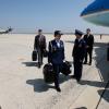 Air Force One readies for departure from Andrews Air Force Base for Waco, Texas, 10 April 2008. Military Aide Lt. Colonel Gina Humble carries the Football