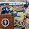 President Kennedy receives the flag of the 2506 Brigade 