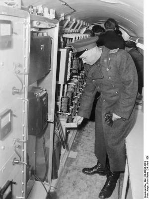 A Soviet officer inspects intercept equipment in a tunnel under East Berlin used by the CIA in the 1950s