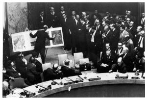 Confrontation at the United Nations, October 25, 1962: deputy NPIC director David Parker points out the photographic evidence while U.S. ambassador Adlai Stevenson (at right) describes the photos. USSR ambassador Valerian Zorin is presiding at far left.