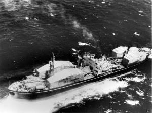 “Crate-ology”: Photographs of crates assessed by NPIC as holding Komar guided-missile patrol boats on their way to Cuba, September 1962.