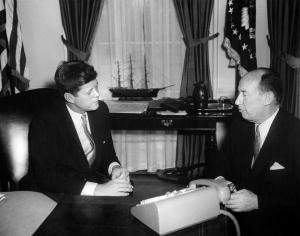President John F. Kennedy with Adlai Stevenson, US Representative to the United Nations. Oval Office, White House, Washington, D.C.