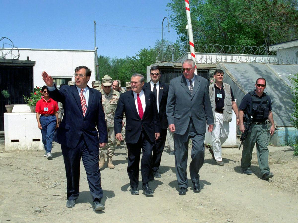 U.S. Secretary of Defense Donald Rumsfeld (center) and U.S. Ambassador to Afghanistan, Robert Finn