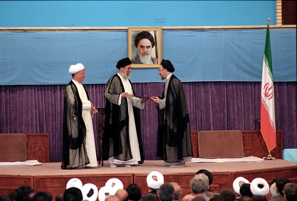 -	Newly elected President Mohammad Khatami (right) at his inauguration ceremony on August 3, 1997