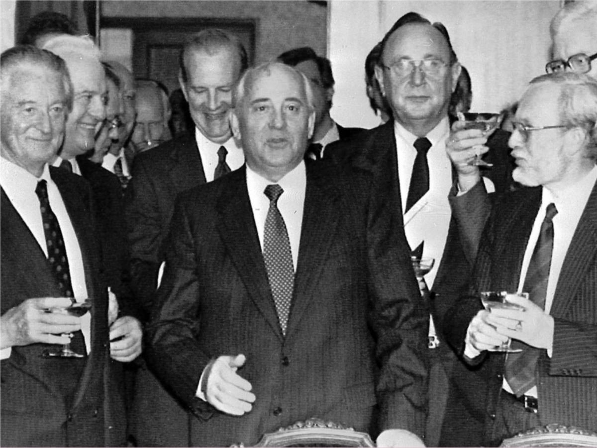 Pictured are Roland Dumas (France), Eduard Shevardnadze (Soviet Union), James Baker III (U.S.), Hans-Dieter Genscher (West Germany), Lothar de Maizière (East Germany) and Douglas Hurd (Great Britain) with Soviet President Mikhail Gorbachev, center.