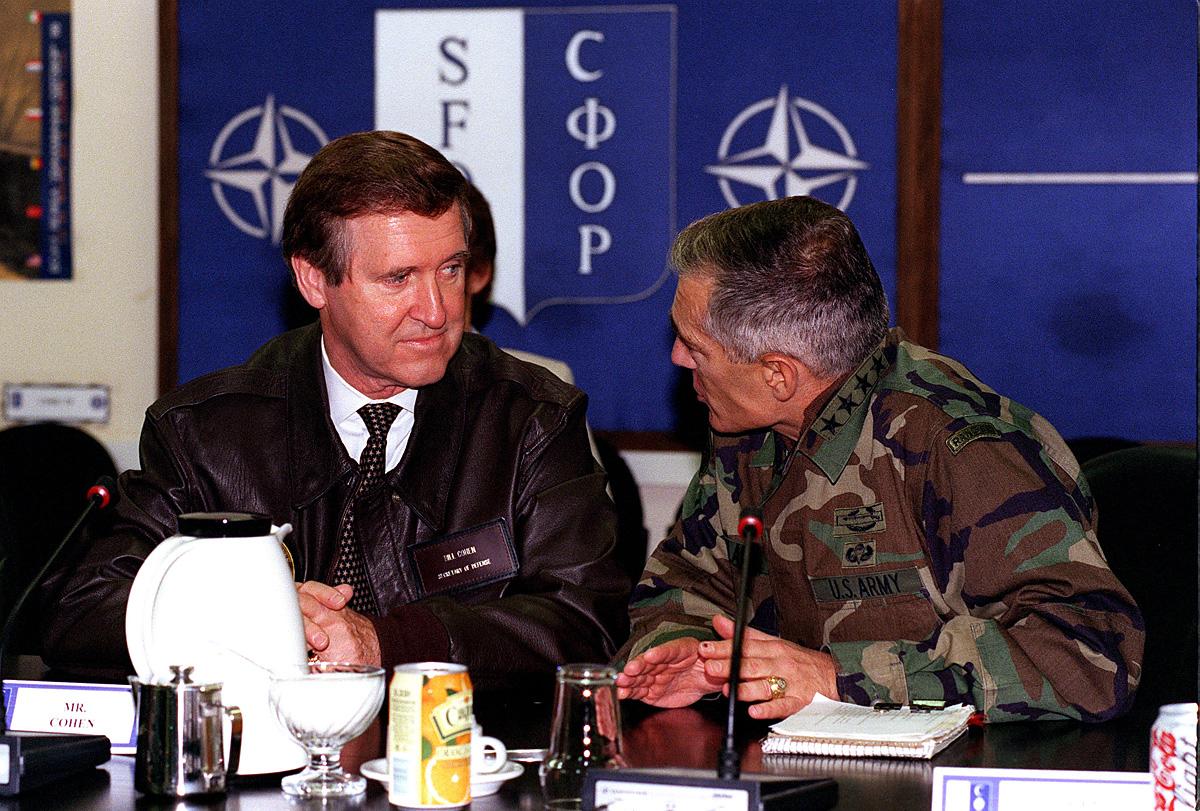 Secretary of Defense William Cohen listens to U.S. Army Supreme Allied Commander for Europe Gen. Wesley Clark in September 1998.