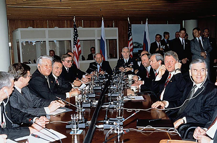 US/Russia summit teams led by Yeltsin (L-C) & Clinton (R-C) mtg. around table (Kozyrev 4L, Clinton team at R fr. L: McLarty, Christopher, Bentsen & Lake). 