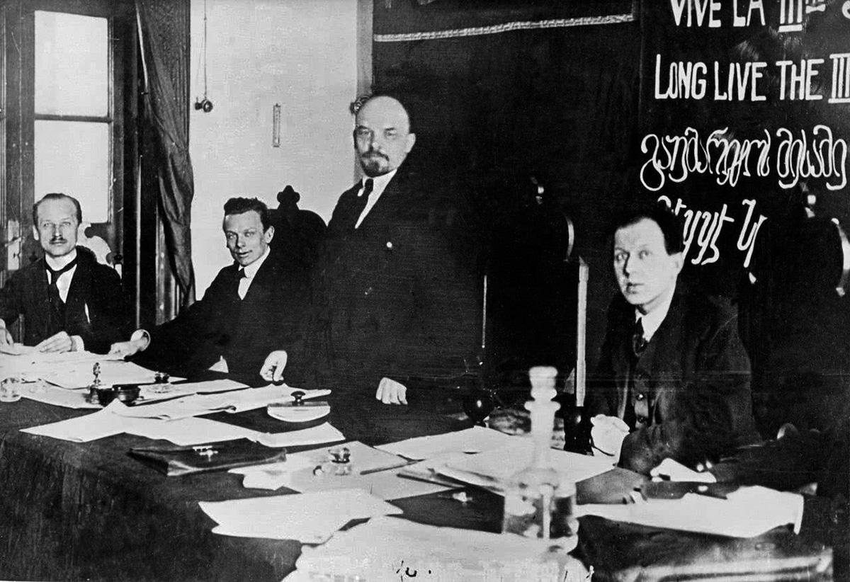 Lenin in the presidium of the First Congress of the Communist International in the Kremlin, Left to right, H Eberlein, Lenin and F Platten, Moscow, 2–6 March 1919.