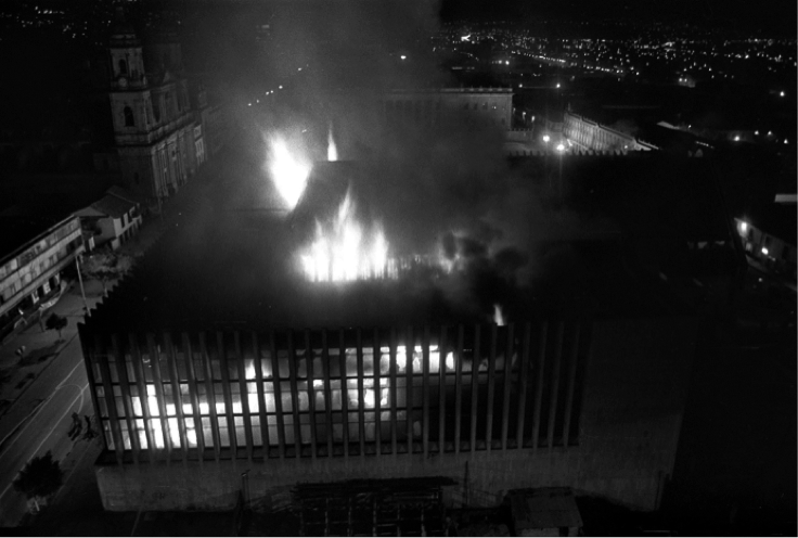 The Palace of Justice building on fire