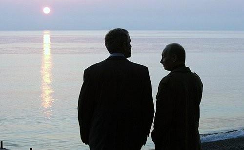 Bush and Putin on sunset
