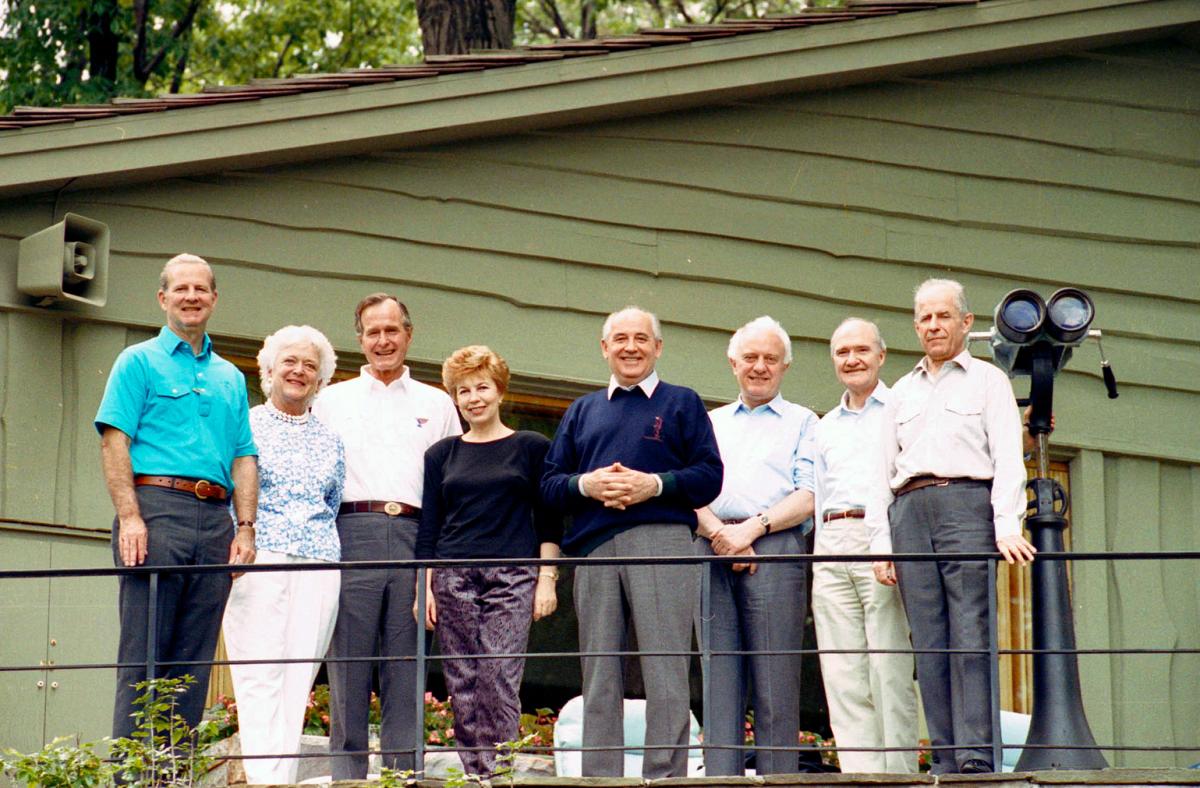 The principals gathered for а group photo at Camp David