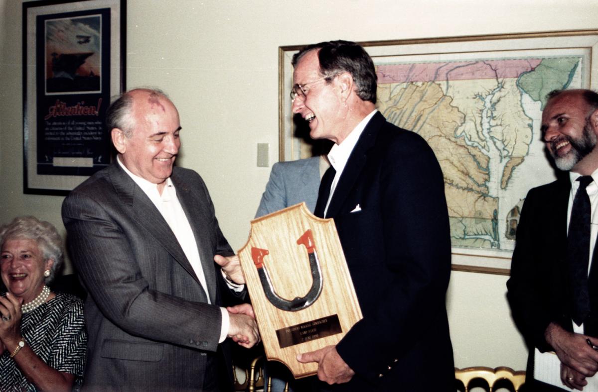 Bush presented Gorbachev with this plaque holding the horseshoe
