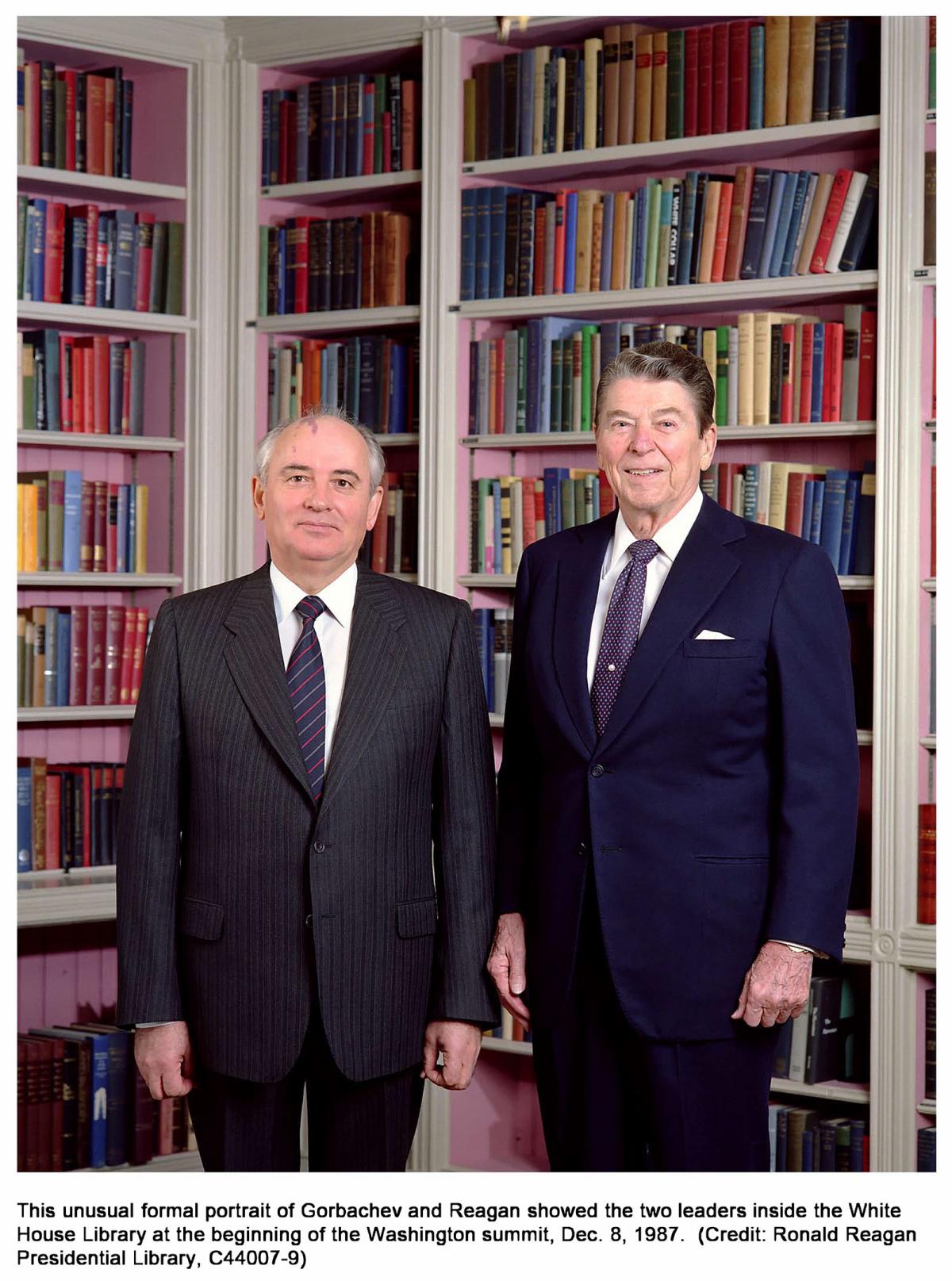 This unusual formal portrait of Gorbachev and Reagan showed the two leaders inside the White House Library at the beginning of the Washington summit, Оес. 8, 1987. 