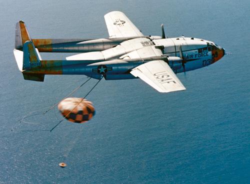 On August 19, 1960, a USAF C-119J made the first midair recovery of a capsule returning from orbit.
