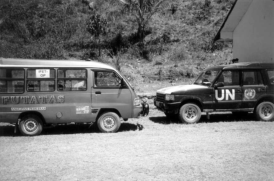 IFET-OP and UN vehicles at polling place, Aug. 30, 1999